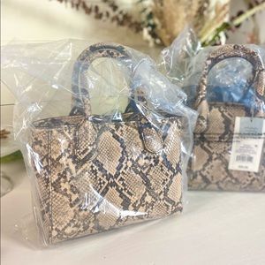 A new day snake skin mini bag